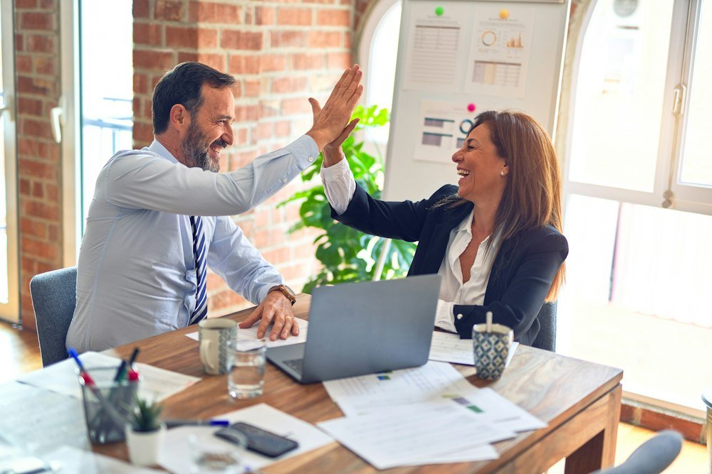 Business handshake after a successful client meeting